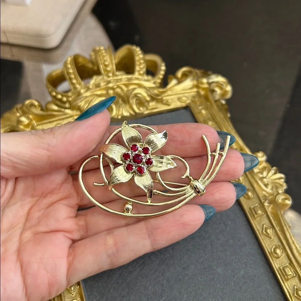 Gold-Tone Floral Brooch with Red Crystal Accents